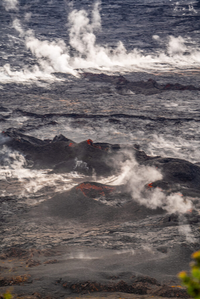 Close-up view of steam and glowing lava vents inside Halemaʻumaʻu Crater at Kīlauea in Hawaii Volcanoes National Park.