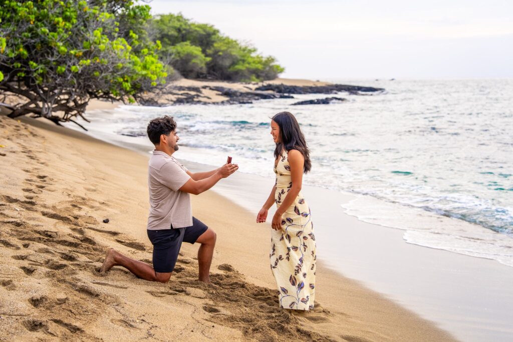 Big Island Surprise Proposals at Anaehoomalu Beach Waikoloa by Hawaii Engagement Photographer