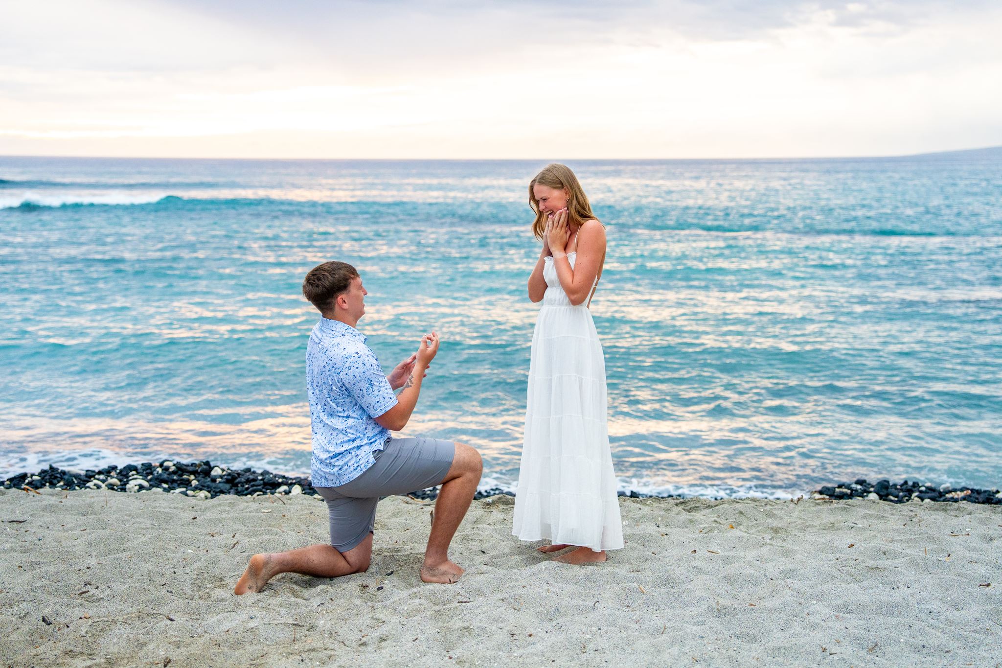 pauoa bay beach fairmont orchid hawaii surprise proposal big island engagement photos