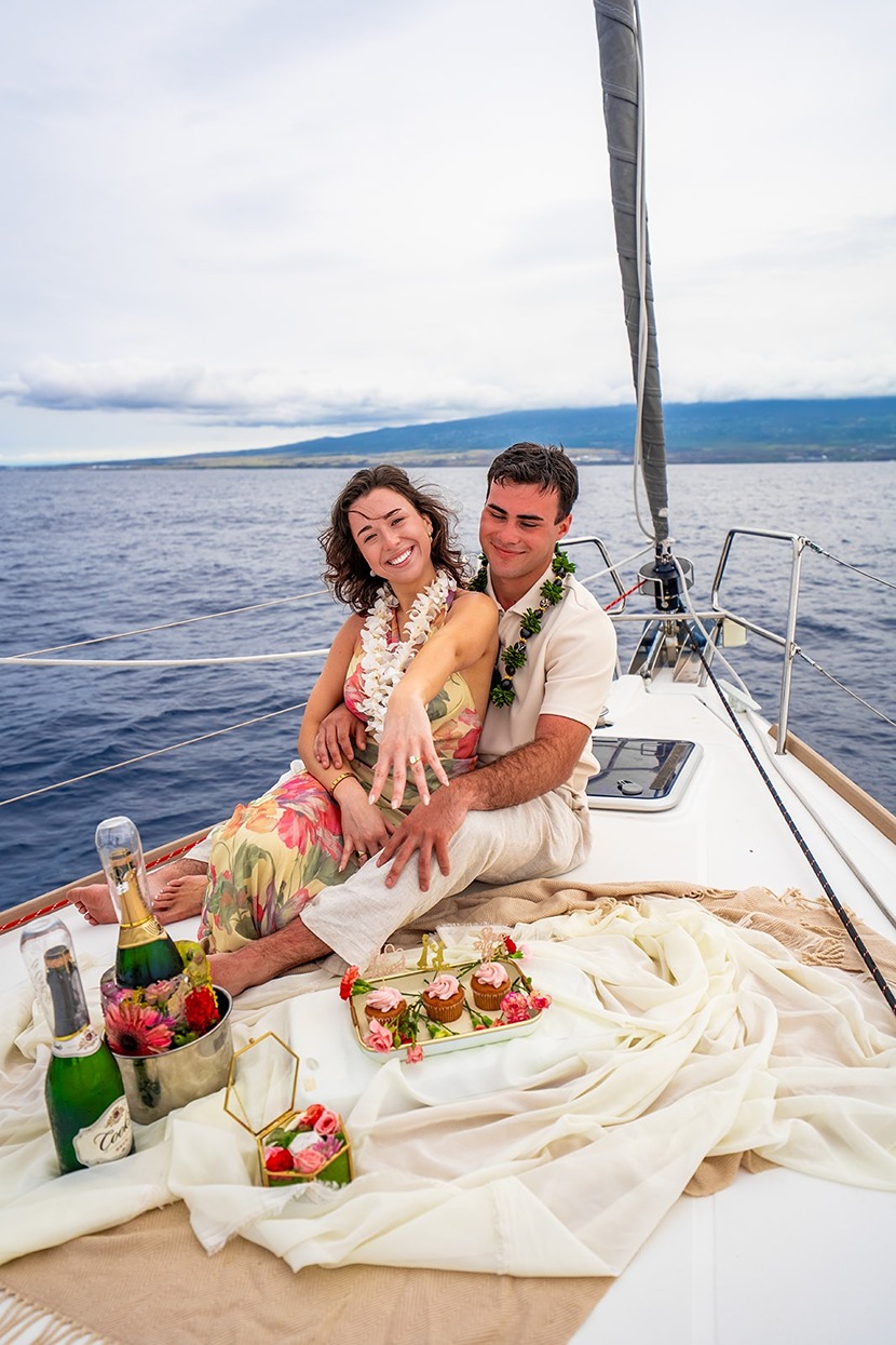 big island engagement pictures on a boat