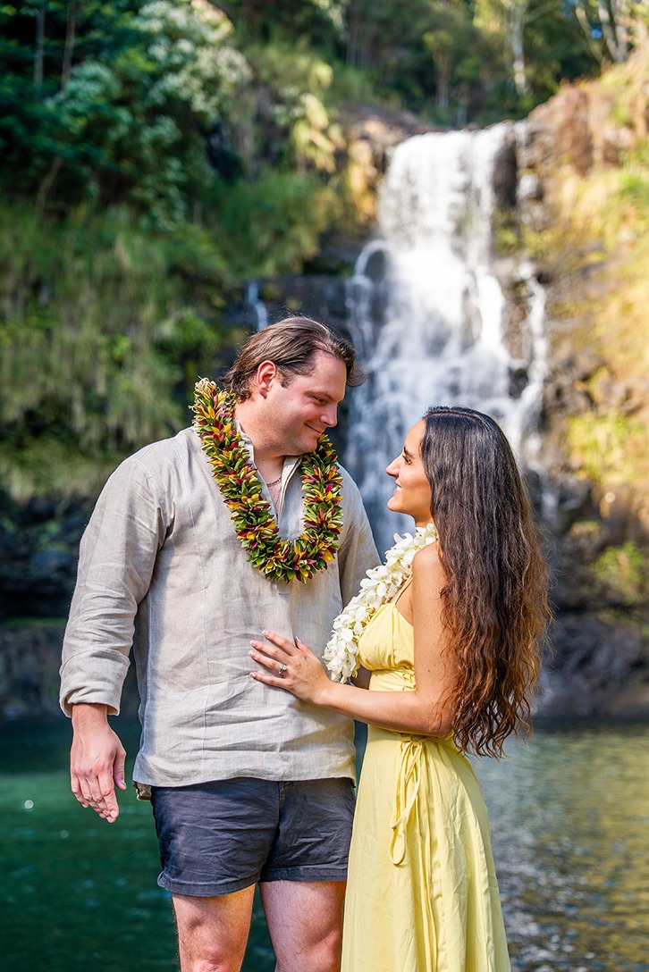 big island engagement pictures in front of a waterfall