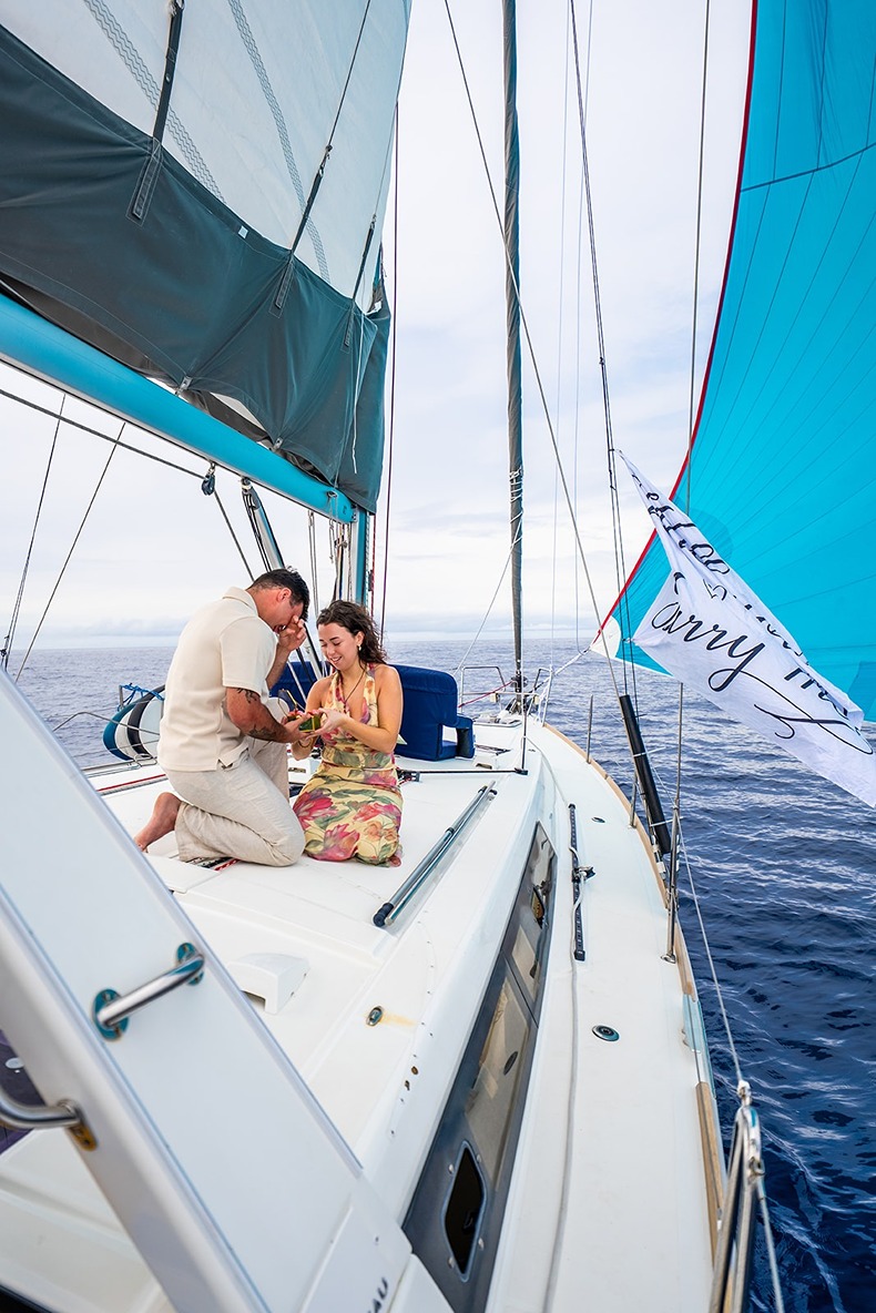 hawaii engagement photos on a boat