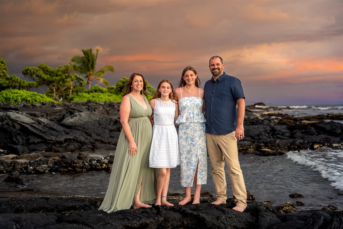 ​extended family portrait on lava rocks