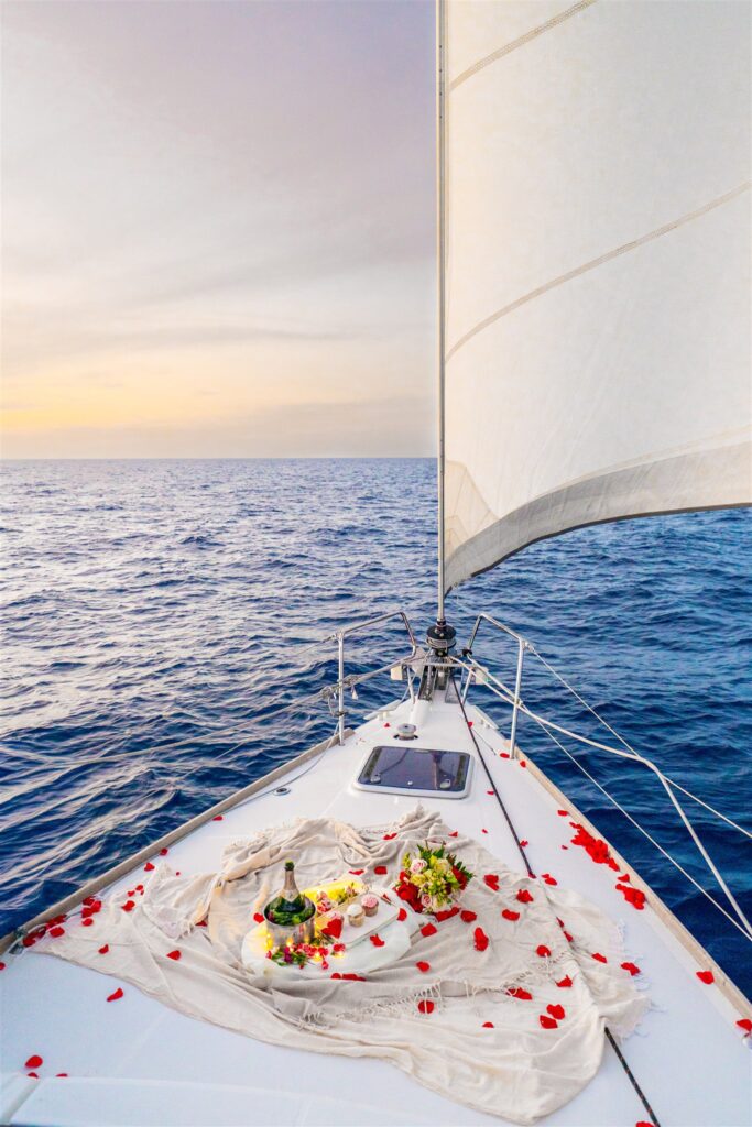 romantic hawaii sailboat proposal by big island engagement photographer